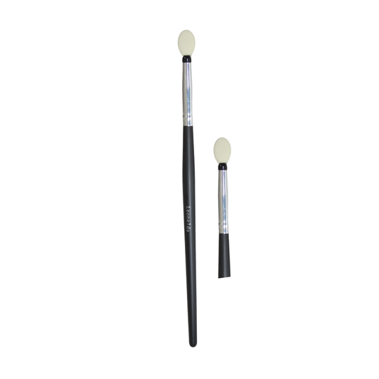 Two makeup brushes with black handles, silver ferrules, and cream-colored oval bristles, shown on a plain white background.