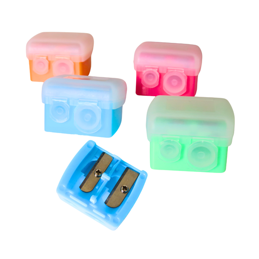 Five small plastic sharpener cases in assorted pastel and bright colors, including orange, pink, light blue, medium blue, and green, arranged on a plain white background.