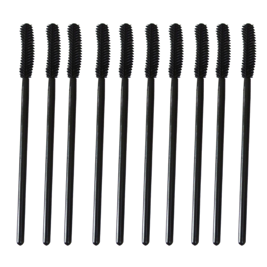 Ten black spoolie-style makeup brushes arranged in a row on a plain white background.
