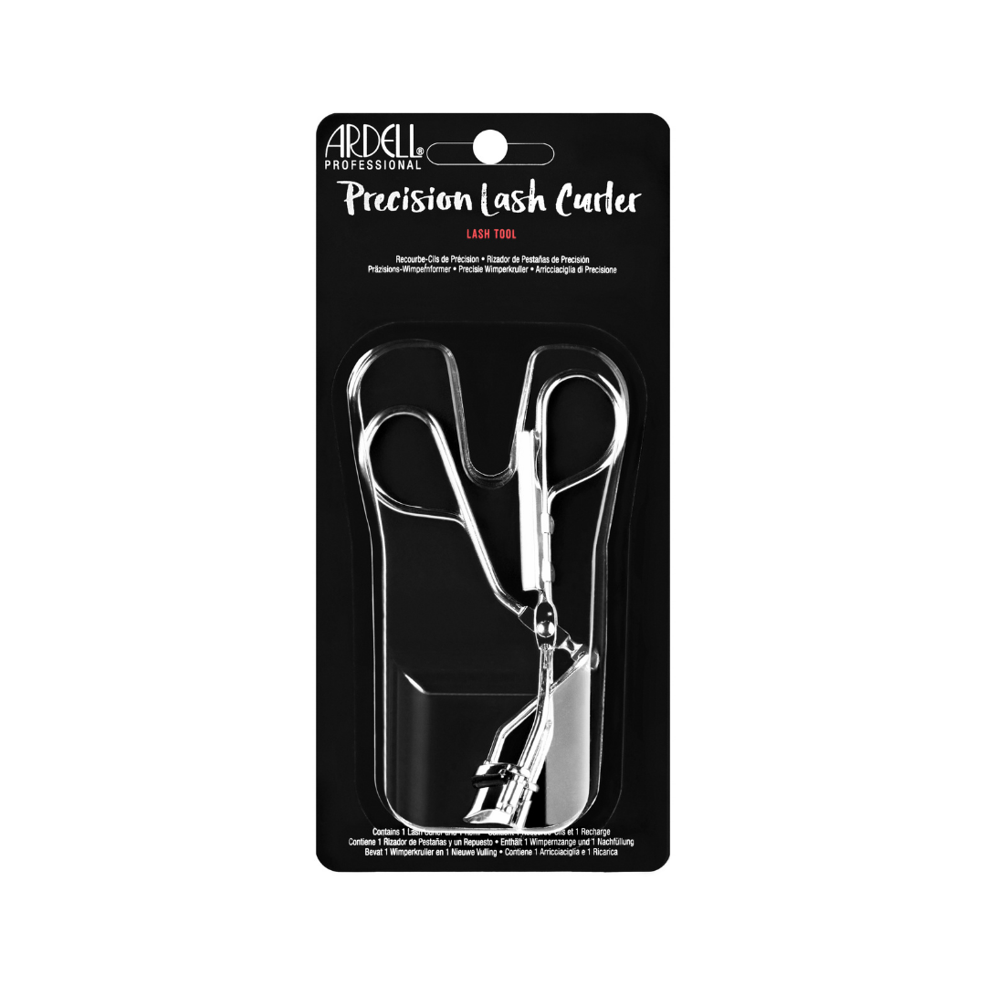 A polished silver metal eyelash curler with black rubber accents, in clear and black packaging, shown on a solid white background.