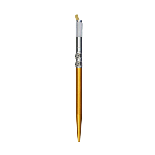 A slim gold micro blading pen tool with a silver textured grip and decorative silver band, isolated on a white background.