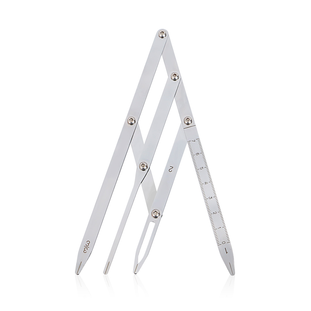 A stainless steel folding divider or caliper tool with engraved measurement markings and screws, shown open on a clean white background.