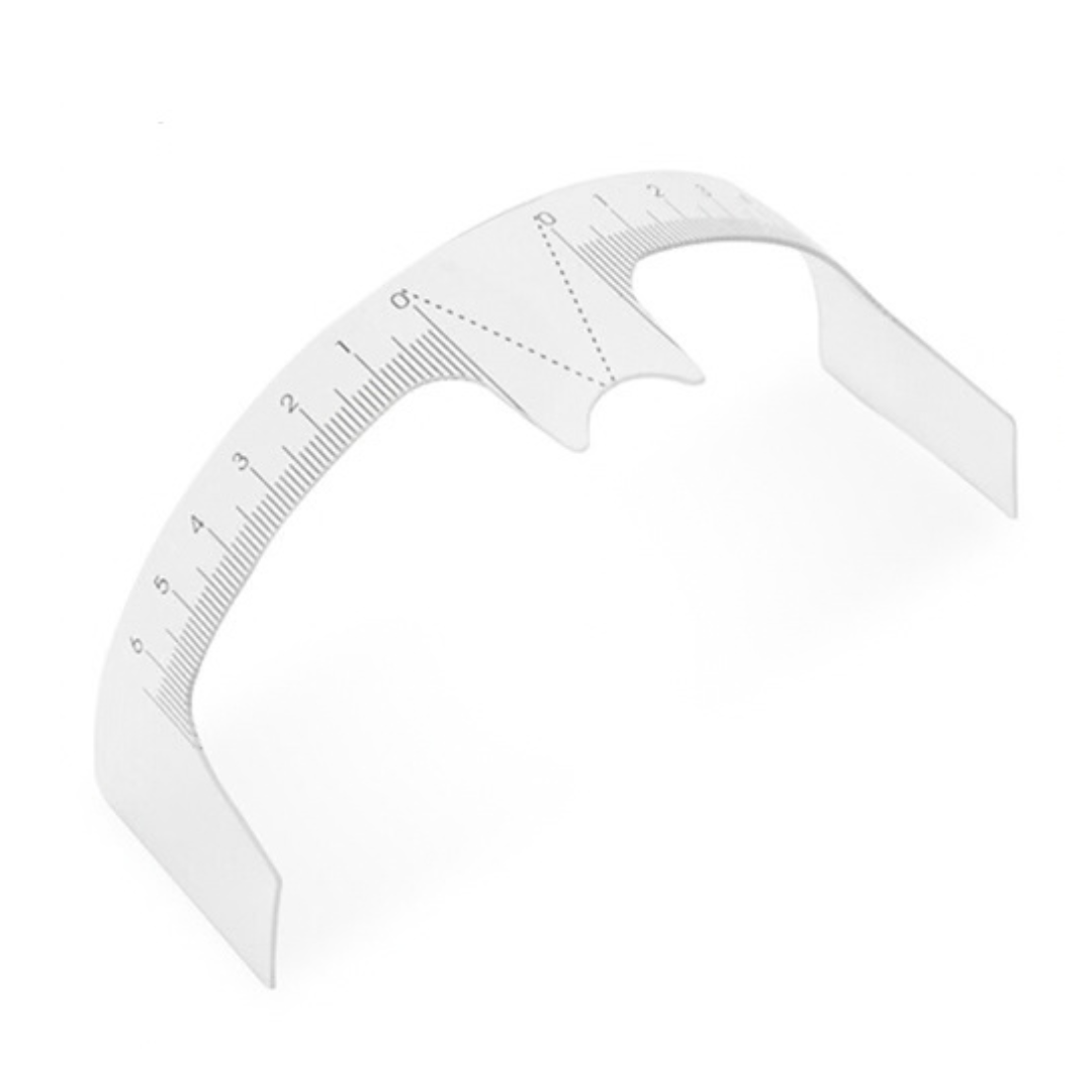 A white plastic arch ruler with printed black measurement markings and guide lines, shown on a clean white background.