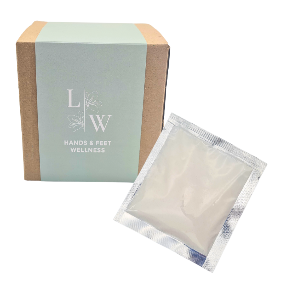 A box set of ten sachets of mineral powder foot and hand soak, alongside a single sachet. 