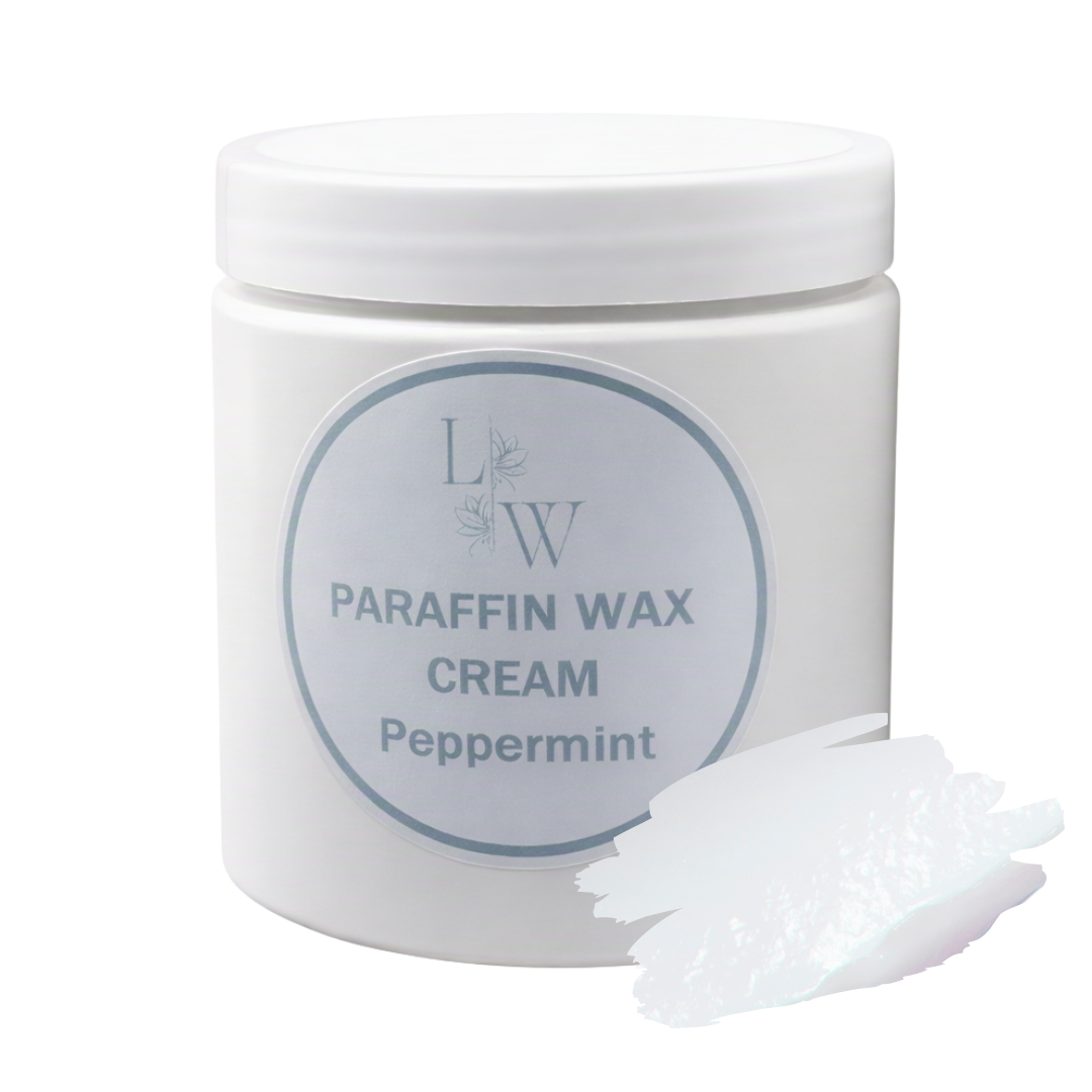 A white plastic jar of LW Paraffin Wax Cream in Peppermint scent, shown on a white background with a small pile of the white wax product in the foreground.