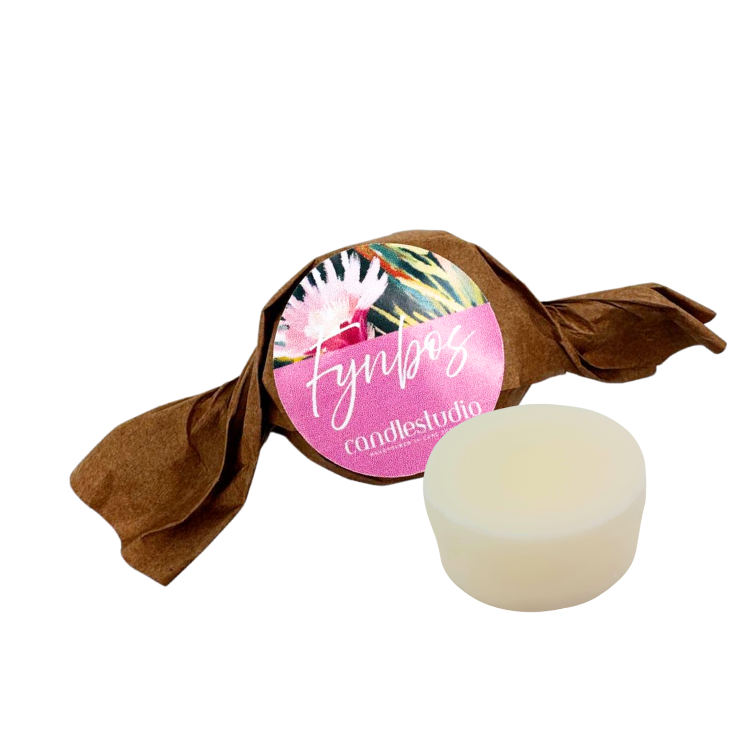 Wax Melt  wrapped in brown paper with a colorful label on a white background