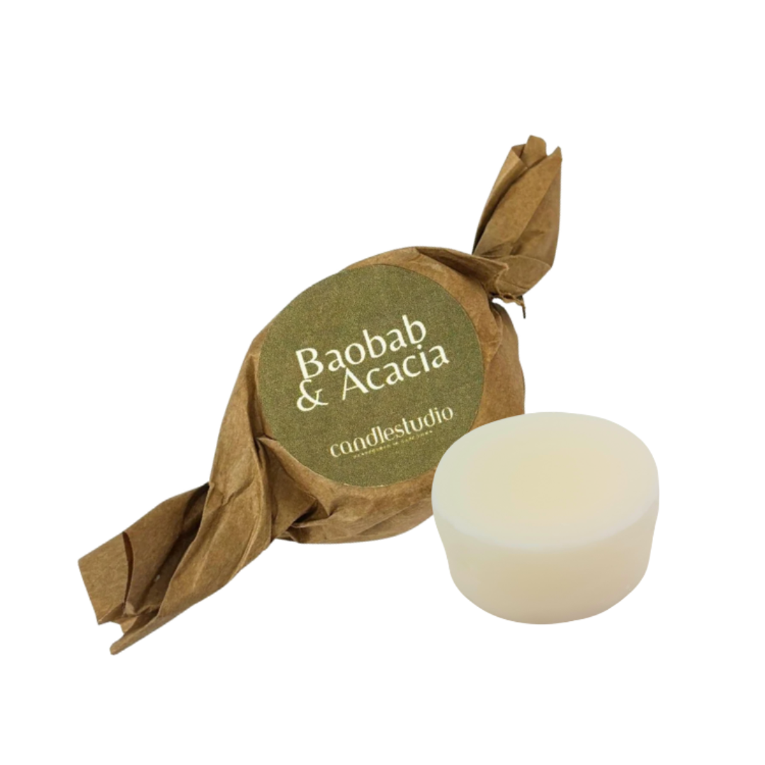 N632 Boabab and Acacia Fragranced Wax Melt | White fragrant wax melt wrapped in brown paper with 'Baobab & Acacia' label on a white background