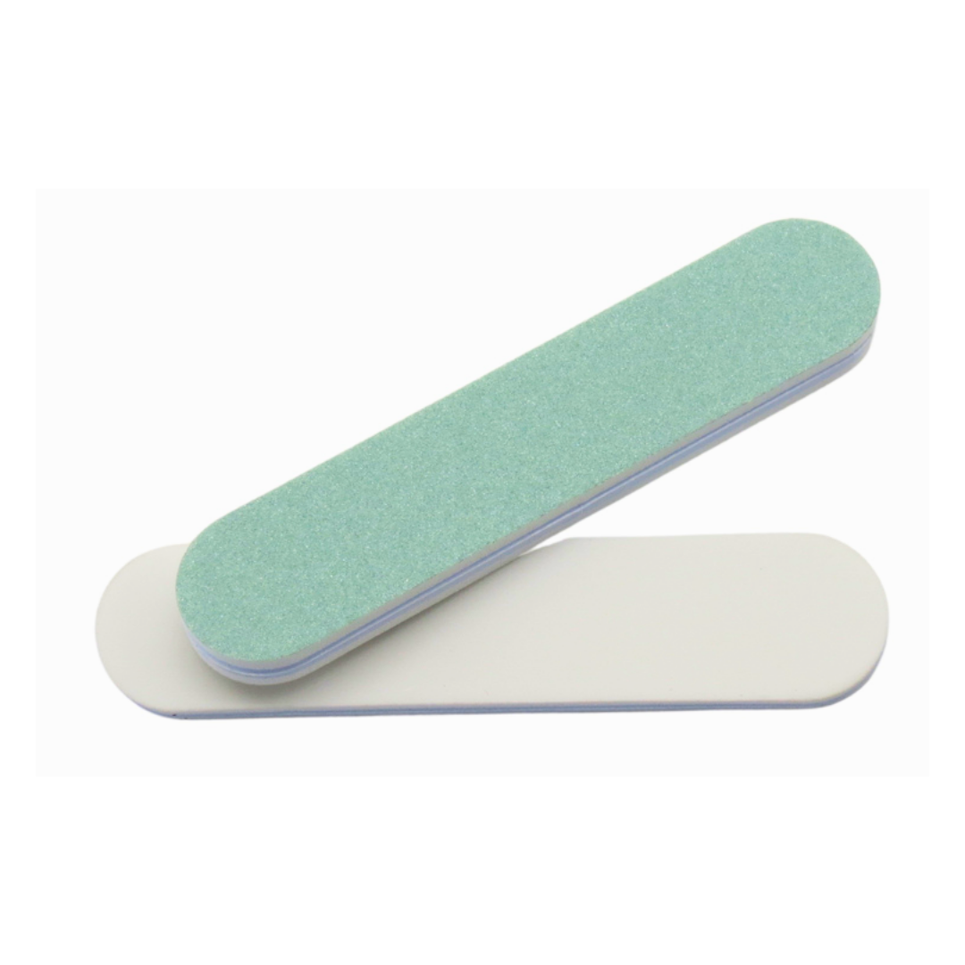 A dual-sided nail file mini shiner with a mint green abrasive side and a white backing side, shown on a plain white background.