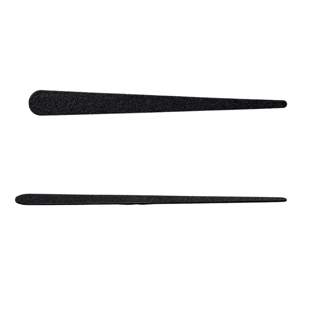 Two black textured teardrop shaped nail files shown horizontally on a plain white background.