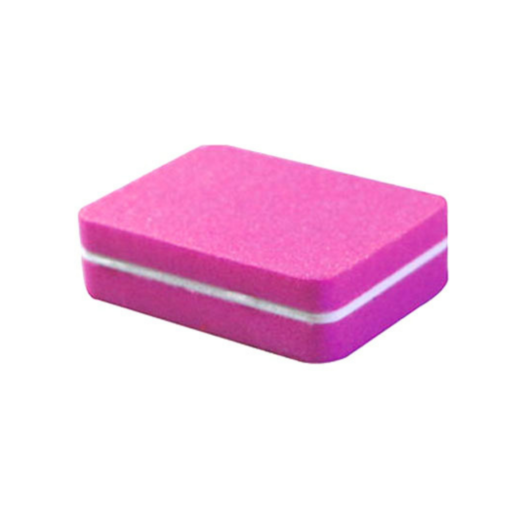 A bright pink rectangular foam nail sanding block with a white center stripe, shown on a plain white background.