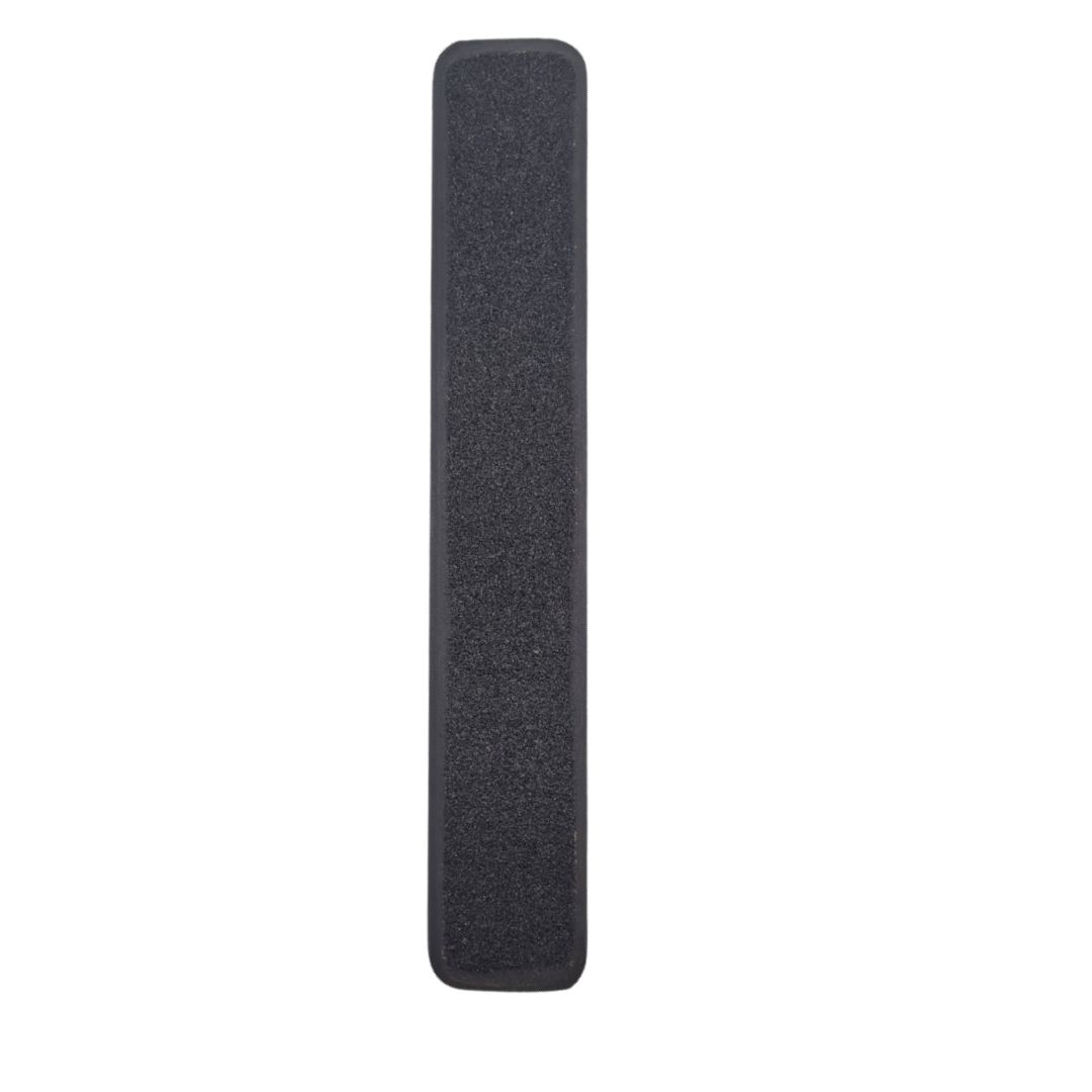 A black textured rectangular foot file pad with rounded corners, shown vertically against a plain white background.