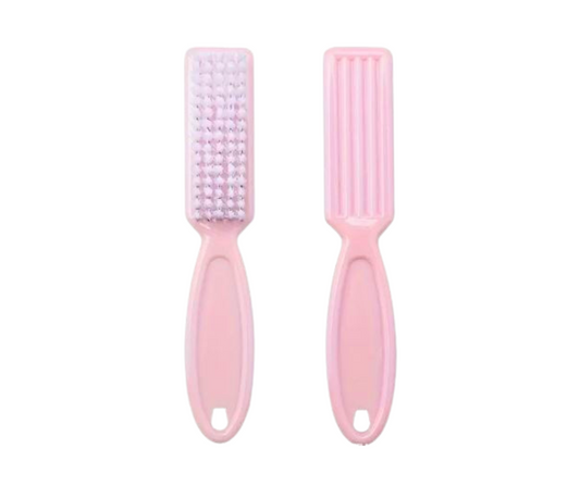 Two pink dusting nail brushes with light pink bristles, shown side by side on a plain white background.