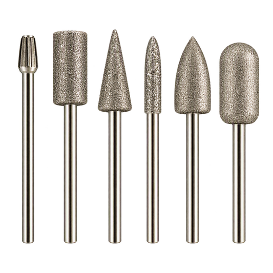 Six diamond nail drill bits in various shapes and sizes, arranged in a row against a solid white background.
