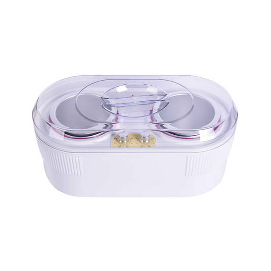 A white plastic wax warmer with a clear lid, featuring two circular holes for wax tins and  small gold-colored variable temperature dials on the front, set against a plain white background.
