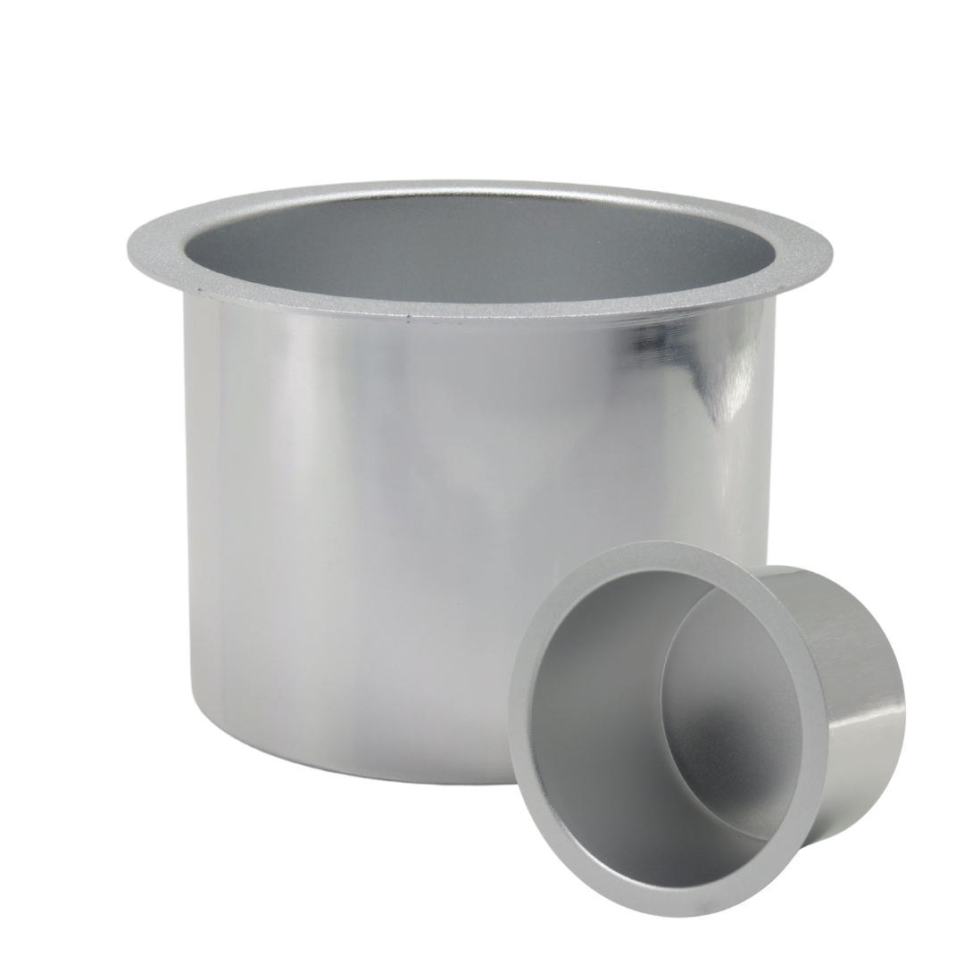 Two metallic silver cylindrical hot or film wax holders, one standing upright and one lying on its side, shown on a plain white background.