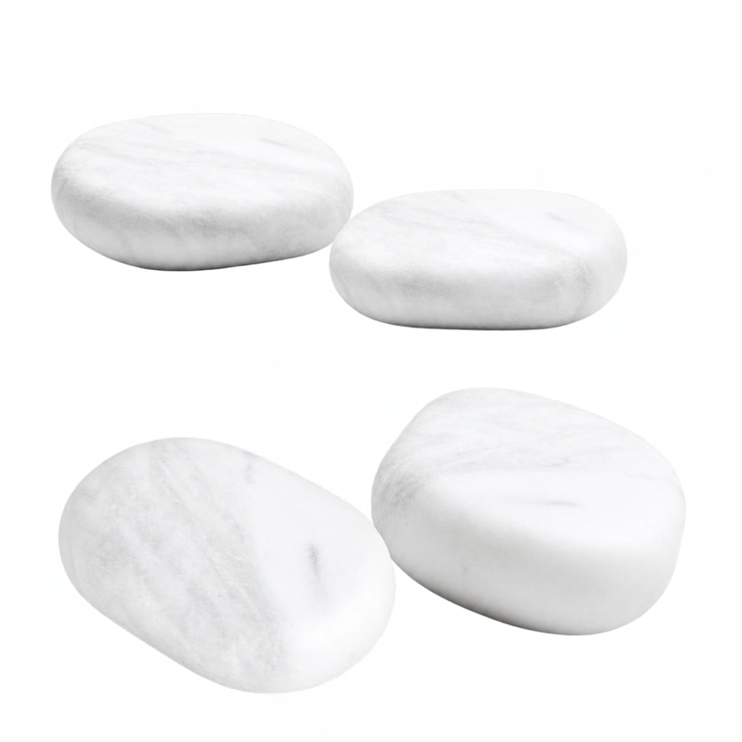 Four white marble pebble-shaped cold spa massage stones arranged on a plain white background.