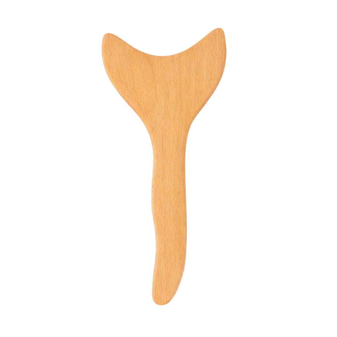 A light natural wood body gua sha paddle or fishtail massage tool with a smooth grain, shown against a solid white background.