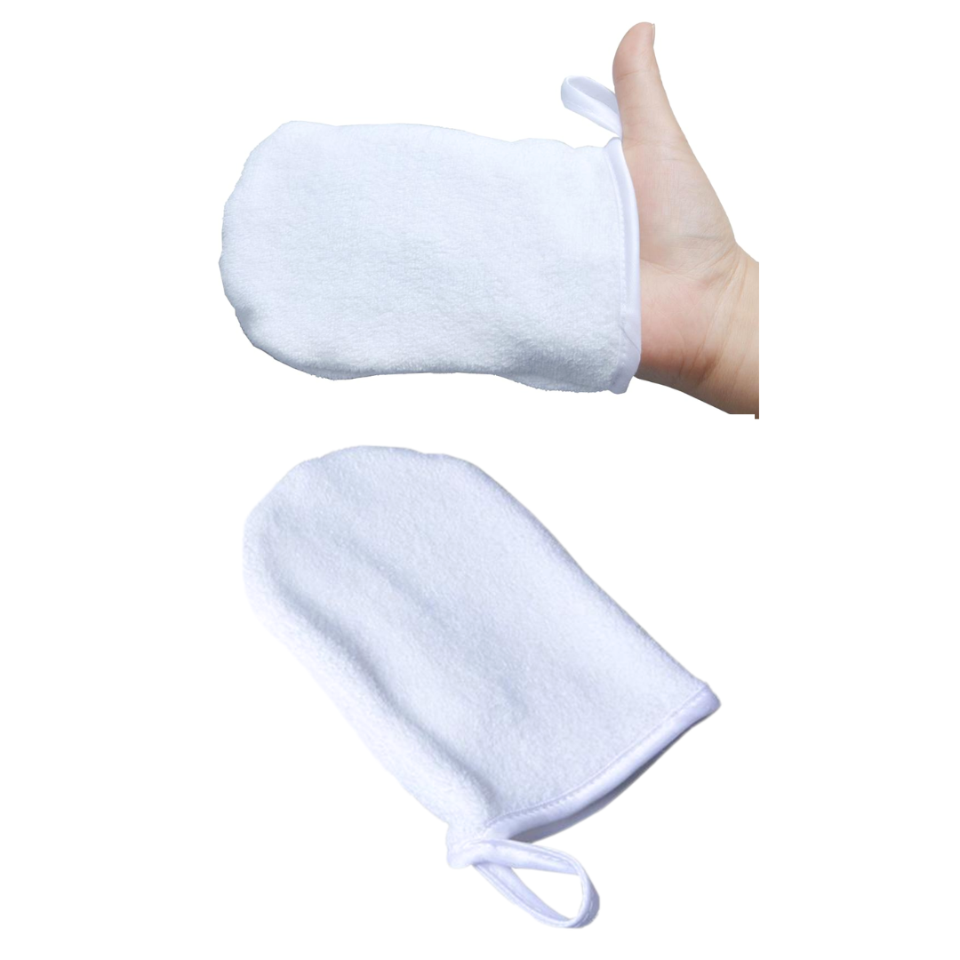 Facial mitt in white displayed at an angle and above it a hand with one mitt in same colour.