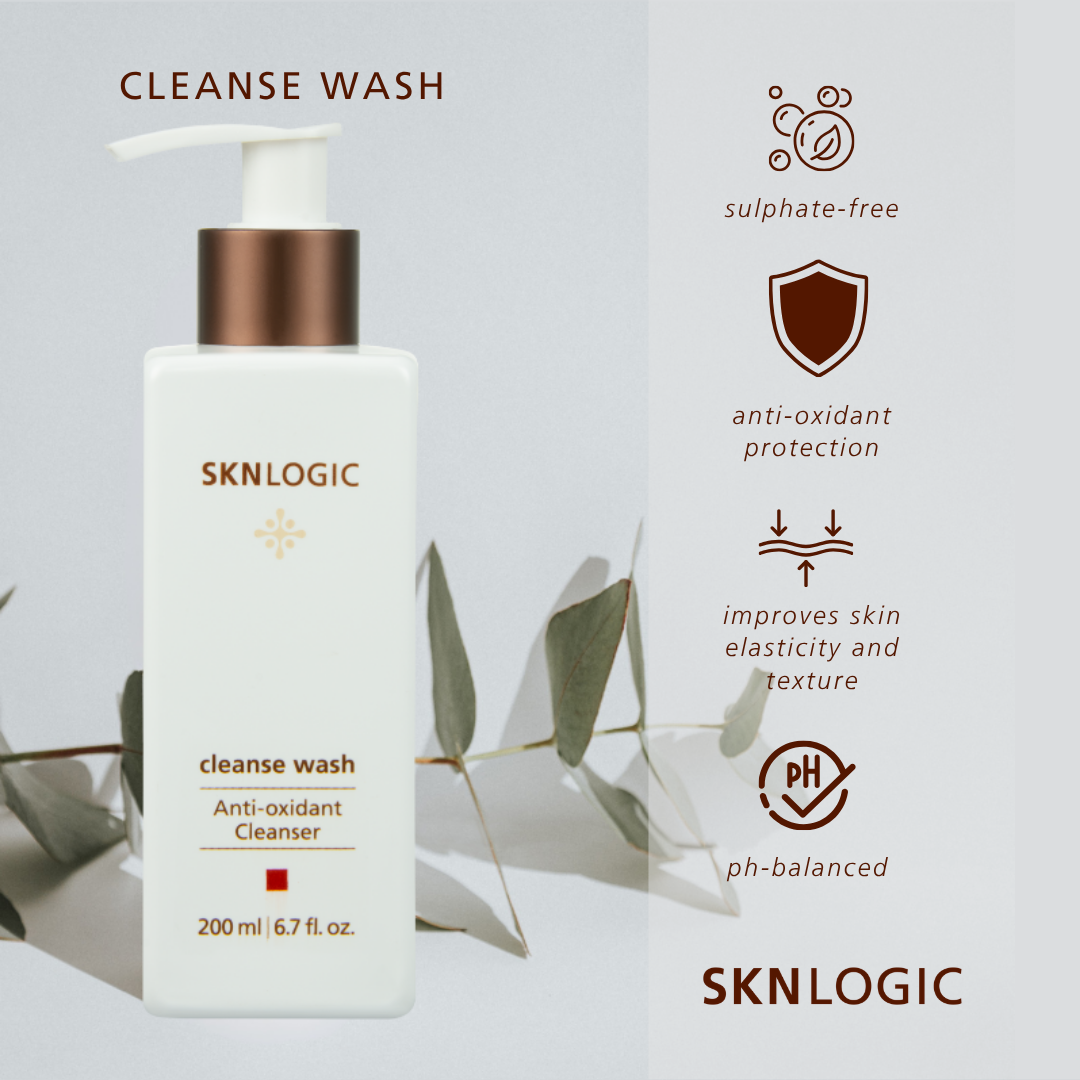 SKN002 SKNLOGIC Cleanse Wash 200ml }SKNLOGIC Cleanse Wash Anti-Oxidant Cleanser in a white pump bottle with a metallic bronze collar, shown next to product feature icons on a light gray background with decorative eucalyptus leaves.