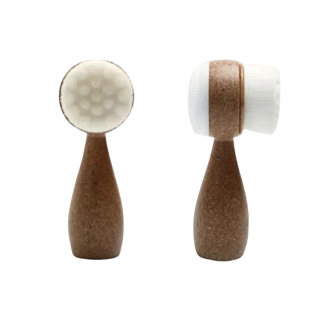 SKN153 Sknlogic Coconut Facial Brush | Two Facial cleansing brushes with wooden handle and white bristle head on a white background