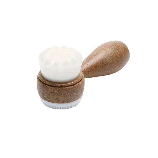 SKN153 Sknlogic Coconut Facial Brush | Facial brush with dual white brush heads and coconut handle on a white background