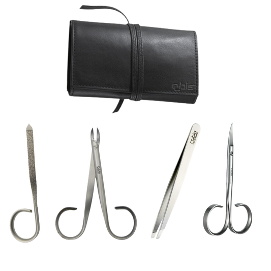 Four stainless steel beauty tools with curved handles are displayed below a black leather carrying case on a white background. The tools include a nail file, crab nail clippers, tweezers, and a small scissors.
