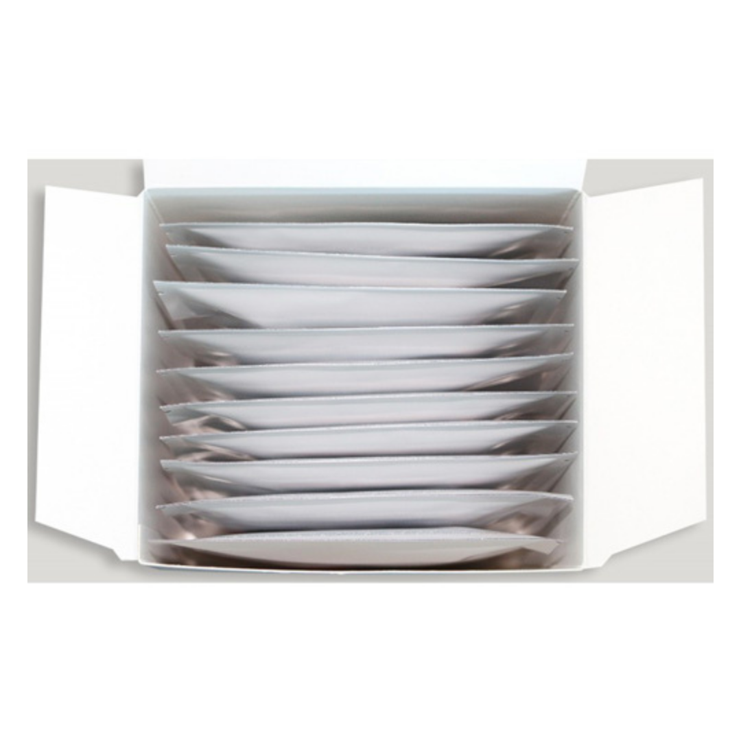An open white box containing multiple flat, rectangular white packets of marine clay mask powder arranged in rows, photographed against a light gray background.