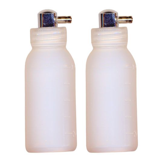 Two translucent white plastic bottle-shaped containers with measurement markings and silver metal pump tops, shown side by side on a plain white background.