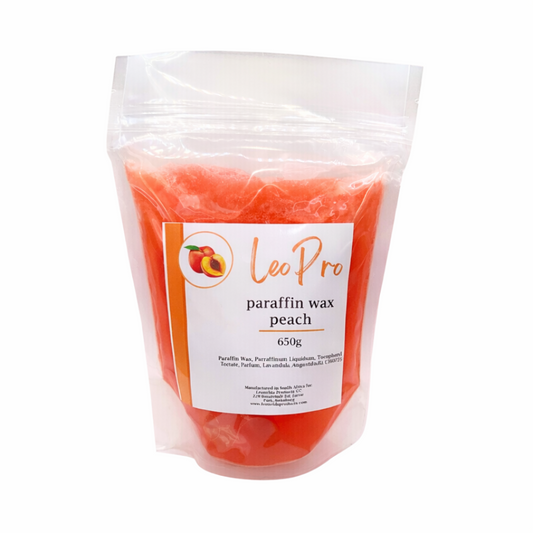 W012K Peach Paraffin Wax 650g | Packaged Peach paraffin wax with 'Leo Pro' branding on a white background