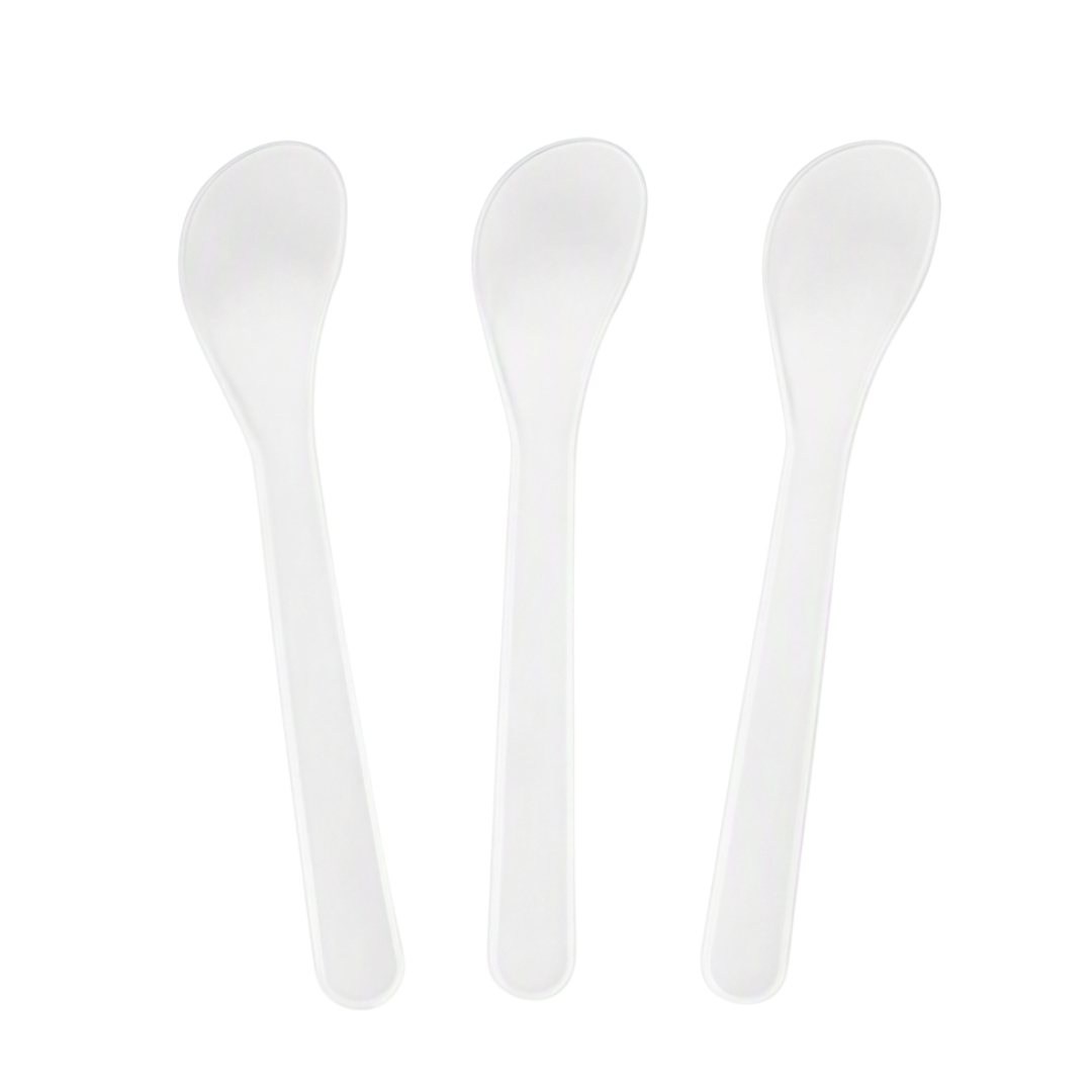 Three white plastic spoon spatulas arranged vertically side-by-side on a plain white background.