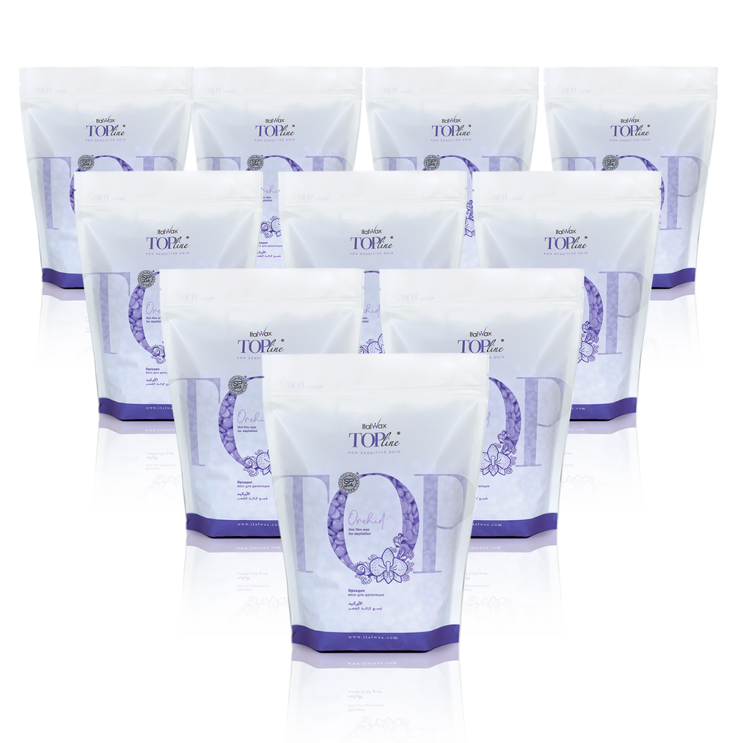 W332 Italwax 10 x 1kg Top Line Synthetic Orchid Film Wax | A collection of light purple Italwax Orchid film wax, for professional hair removal, in a white and purple branded Italwax plastic bag with light purple wax beads showing 