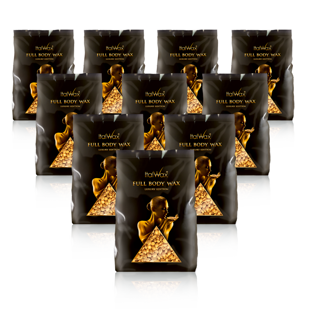 W323 Italwax 10 x 1kg Full Body Film Wax | A collection of gold Italwax Film Wax, for professional hair removal all over body, in a black and gold branded Italwax plastic bag with gold beads showing 
