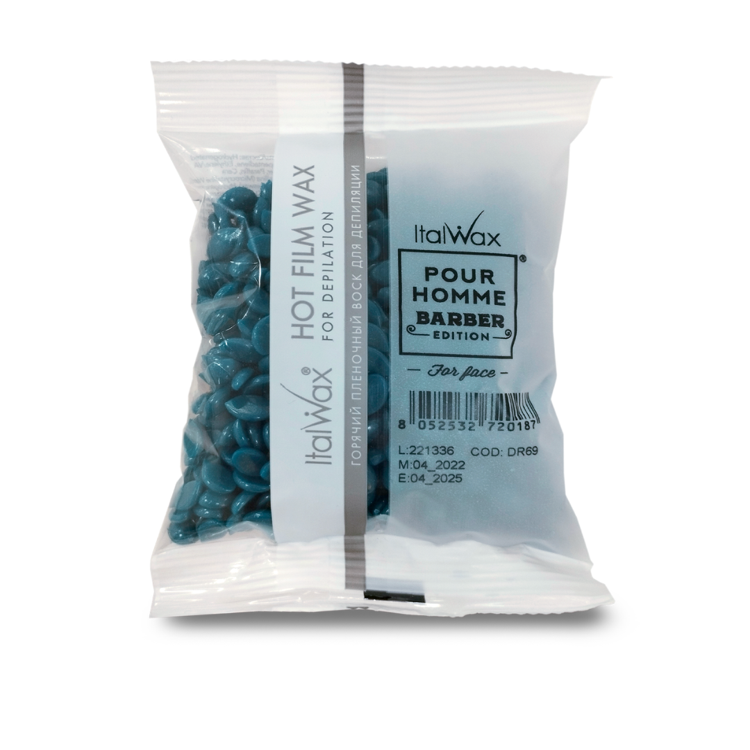 W326A Italwax Pour Homme Barber Film Wax | A clear plastic bag of ItalWax Pour Homme Barber Hot Film Wax for male depilation, showing blue-green wax beads inside. The packaging features a white label with black text and a gray vertical stripe.