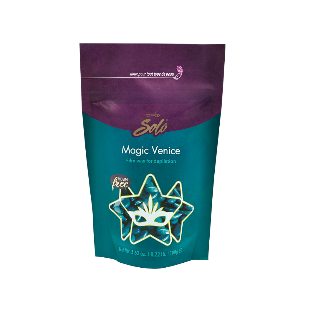 A stand-up pouch package of Italwax Solo Magic Venice film wax for male depilatory hair removal, featuring a dark teal and purple design with a star-shaped mask graphic.