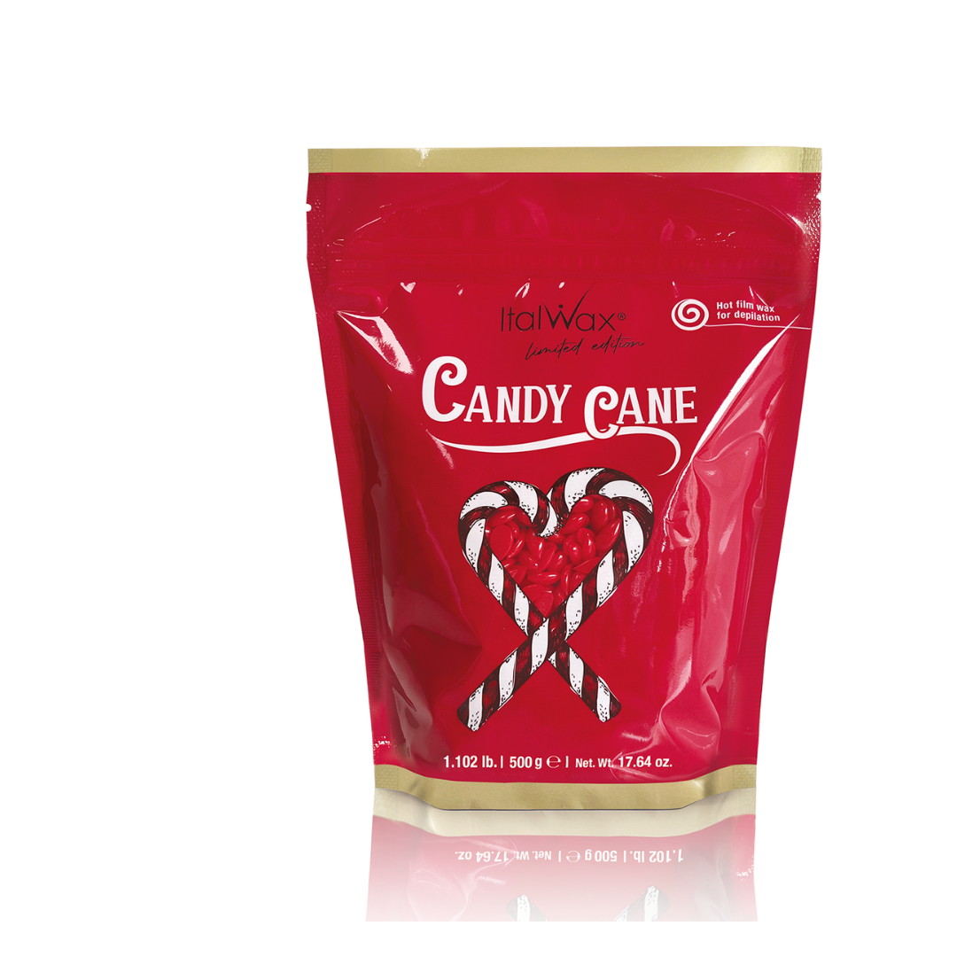 W502 Italwax Candy Cane Film Wax | A red stand-up pouch of Italwax Candy Cane film wax, featuring a graphic of two striped candy canes forming a heart with red petal wax inside, on a white background with a faint reflection.