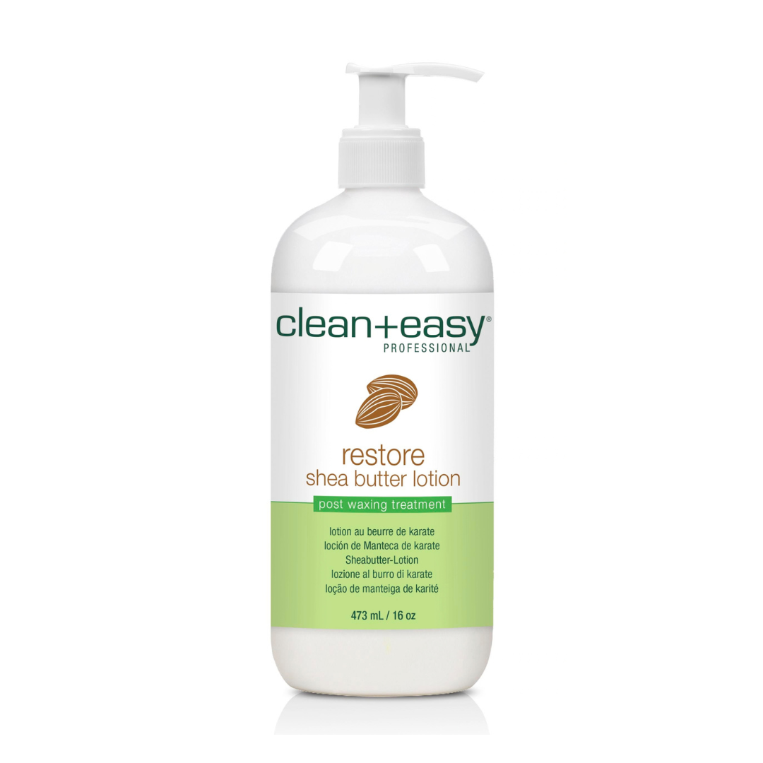 Clean + Easy Professional Restore Shea Butter Lotion in a 473 mL (16 oz) white pump bottle with a green and brown label, shown on a white background with a soft reflection.