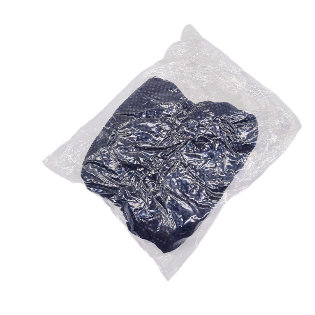 Z702B  Disposable Mens Tanga | A sealed, individually wrapped black disposable man tanga in a plastic packaging.