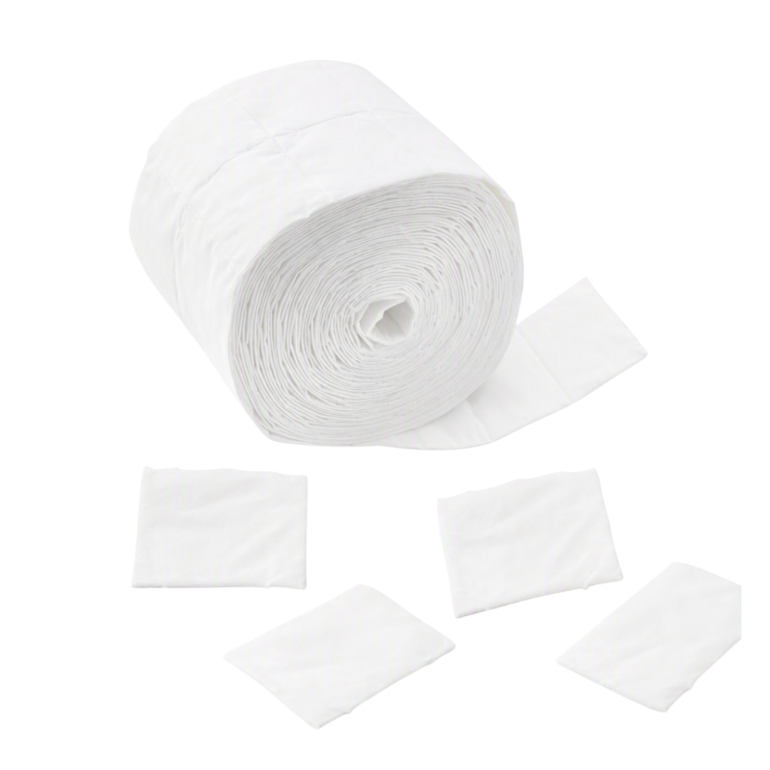 A white roll of tear able lint free squares and some squares in the foreground