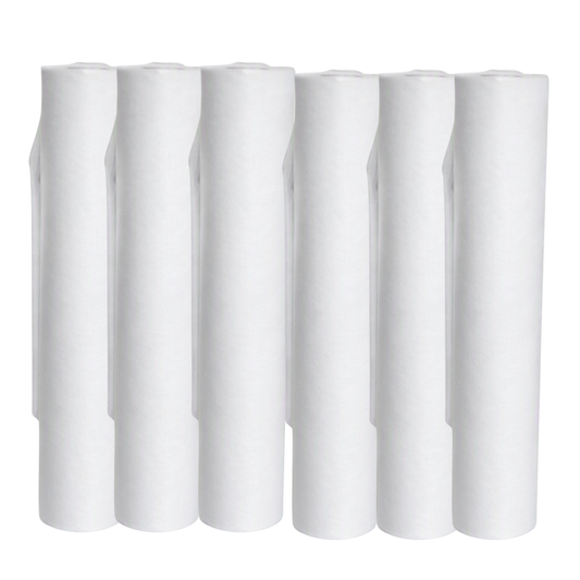 Six white woven bed sheets rolls standing upright in a row against a plain white background.