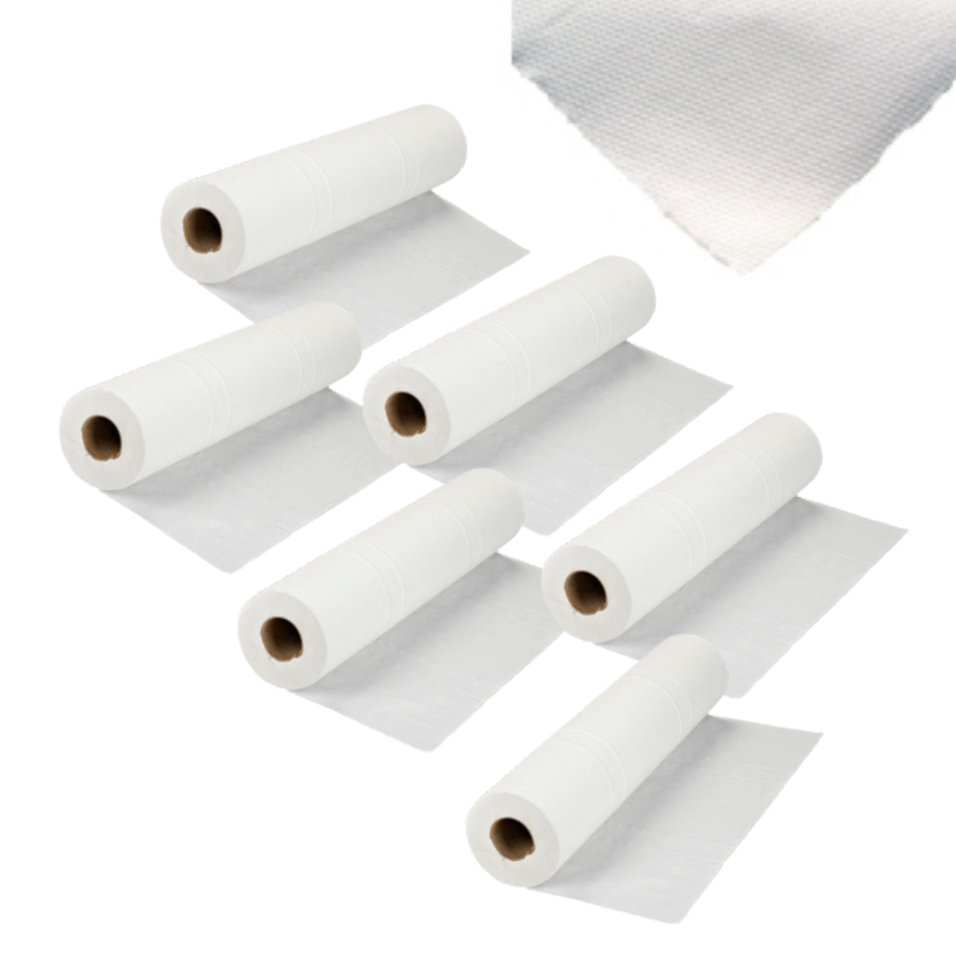 Z708B White 2 Ply Waffle Print Paper Roll for Massage Bed 60cm by 80cm | Multiple rolls of white paper on a white background