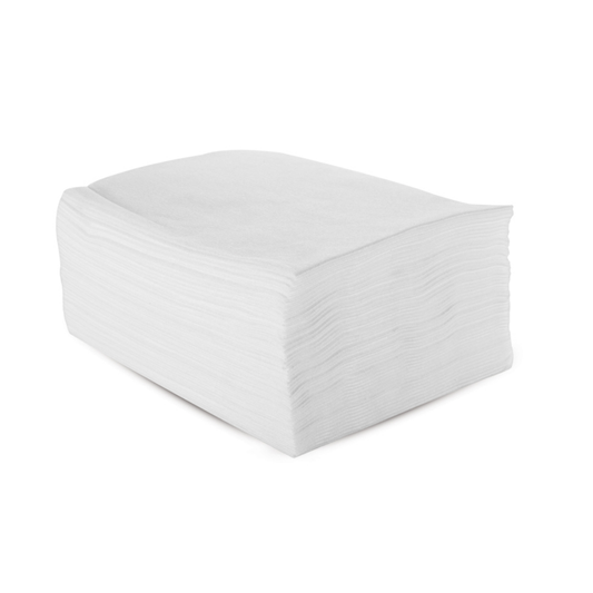 Z711 Super Absorbent Disposable Towel | A stack of white disposable towels with a textured surface, photographed on a seamless white background.