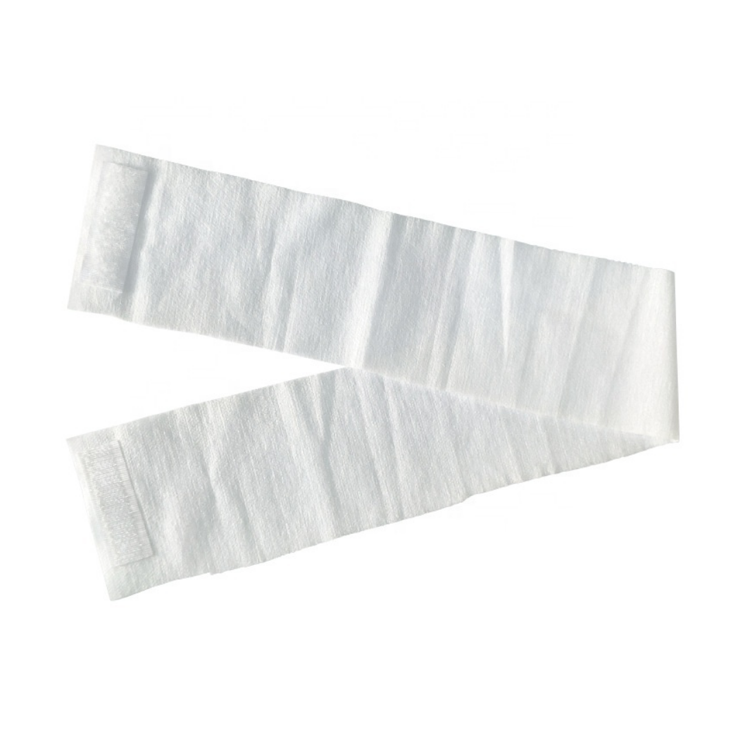 A white disposable headband with hook-and-loop closures, laid flat on a white background.