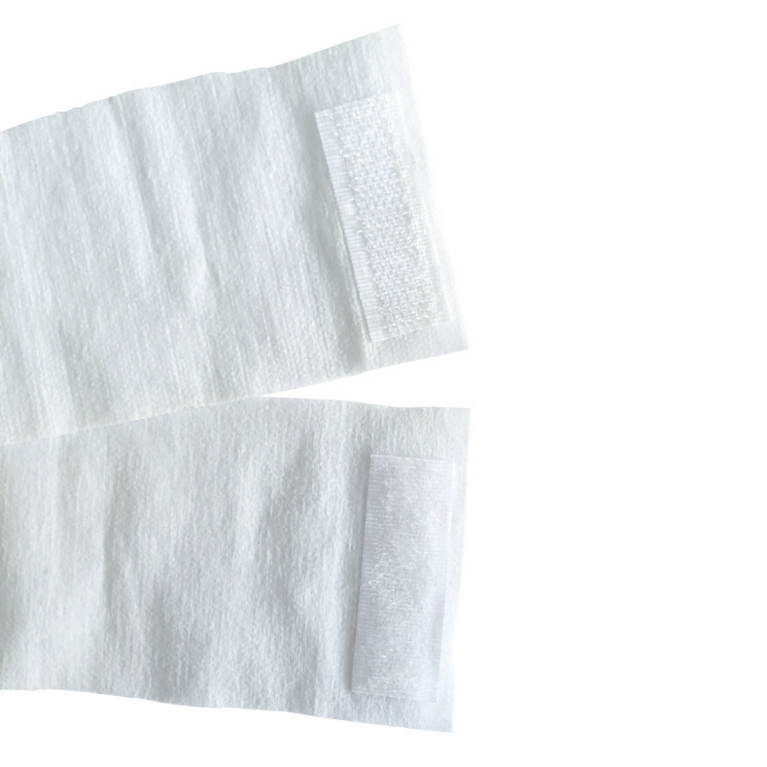 Two white textured disposable headband fabric strips with rectangular hook-and-loop fastening patches, shown on a plain white background.