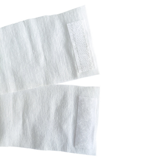 Two white textured disposable headband fabric strips with rectangular hook-and-loop fastening patches, shown on a plain white background.