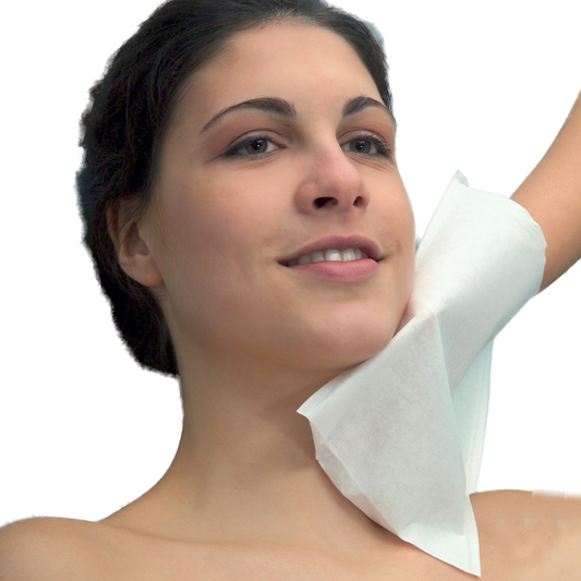 Z731 Disposable Face Wash Mitten | A female with a hand with a woven fabric mitten on her jawline cleansing the skin