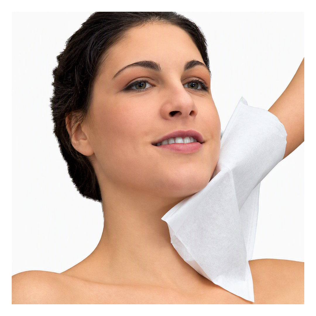 Z731 Disposable Face Wash Mitten | A female with a hand with a woven fabric mitten on her jawline cleansing the skin