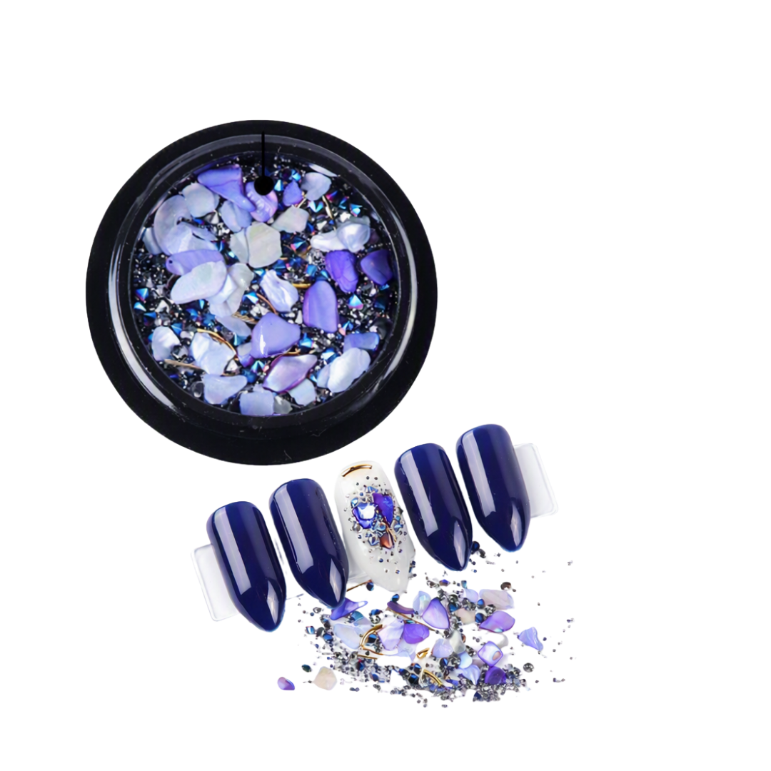 Lilac and Purple micro zirconium shell stones for nail art in black round container with examples of nail art in foreground 