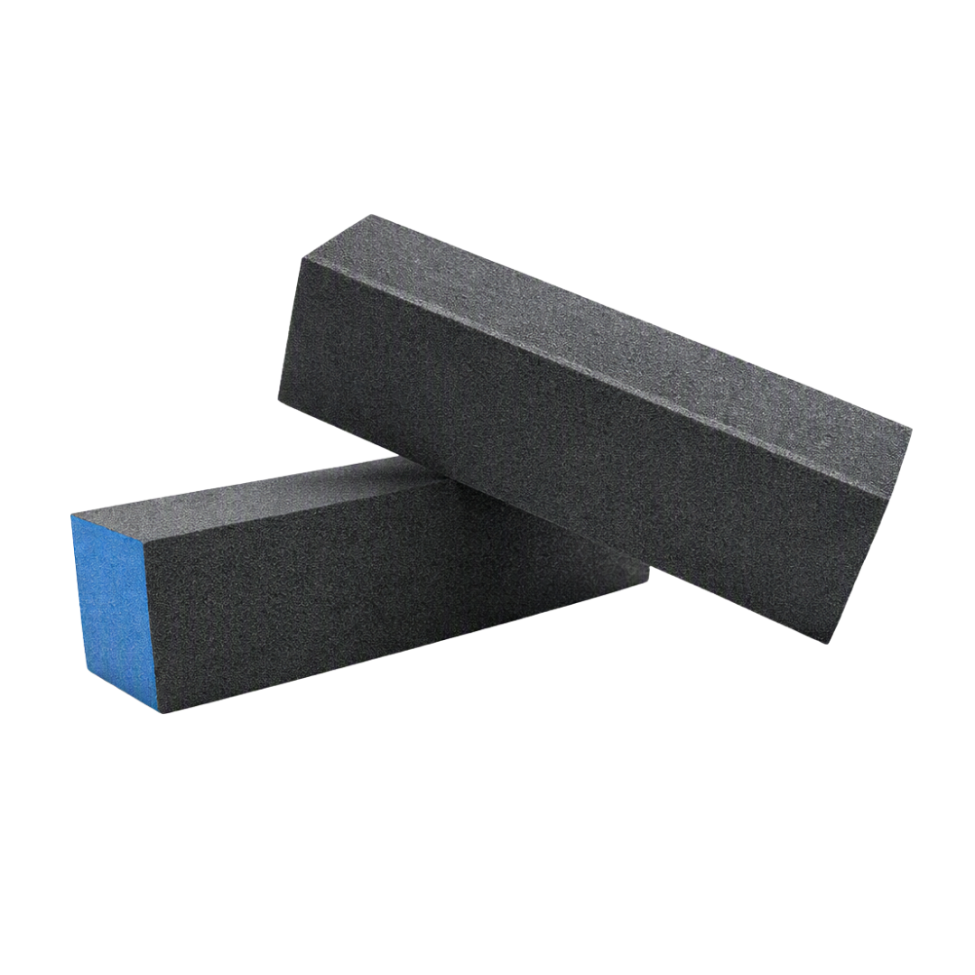 Two rectangular nail buffing blocks with a textured black surface and a bright blue end, shown on a plain white background.