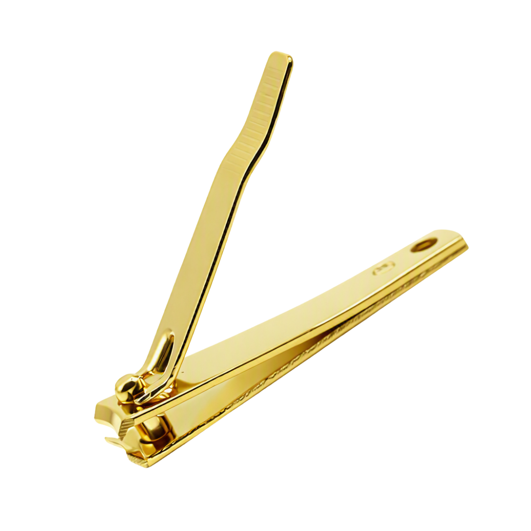 A gold-colored metal toenail clipper shown open against a solid white background.