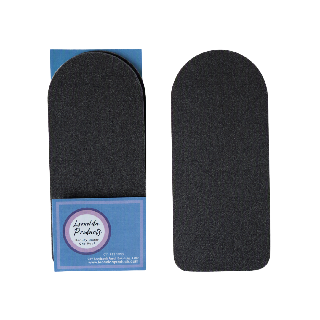 Two black textured abrasive disposable 180 grit pads shown on a white background, with one pad partially inserted into its blue paper sleeve packaging. The sleeve features a circular logo for 'Leonelda Products'.